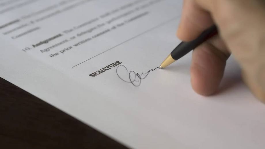 A company document being signed