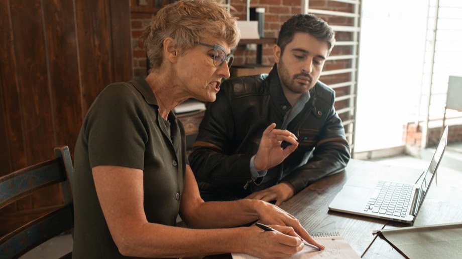 An adviser going through a plan with a business owner